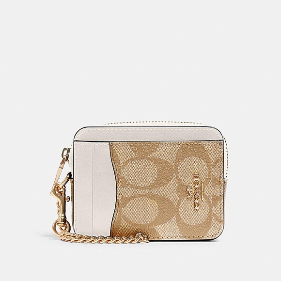 Coach Handbags - Coach Zip Card Case in Signature Canvas